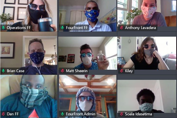 Screenshot of FourFront employees wearing face masks for a video conference